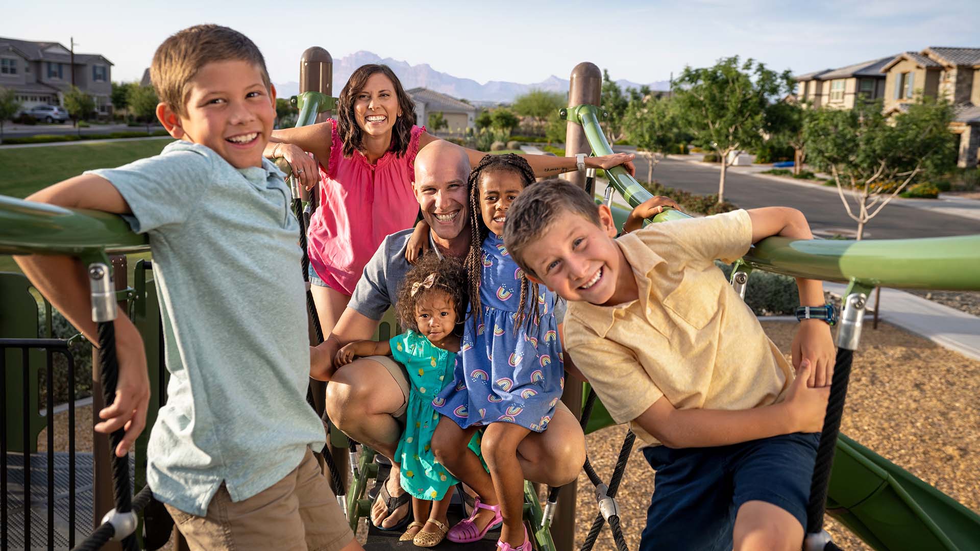 Eastmark family on play equipment