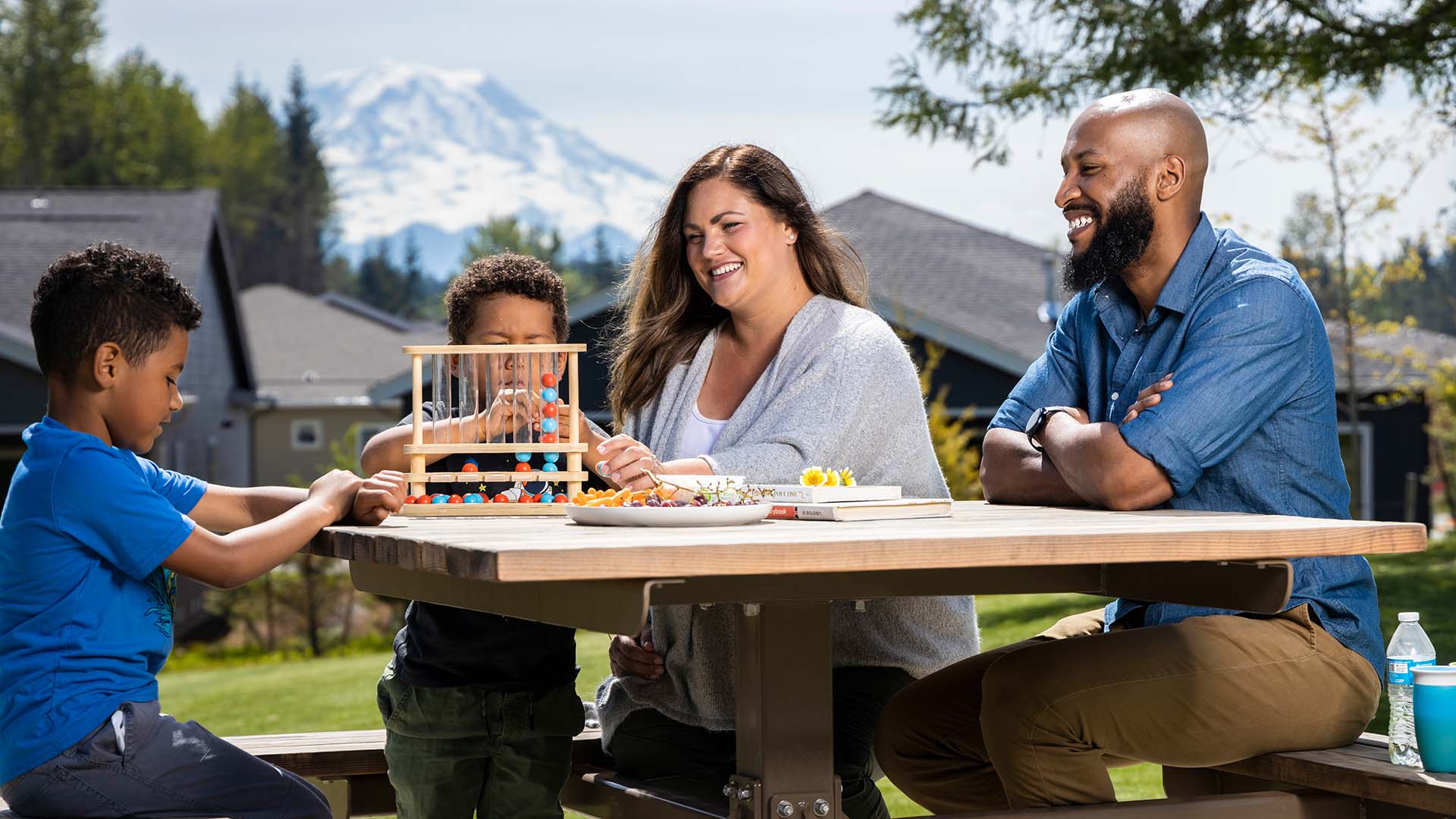 Family playing games at a picnic
