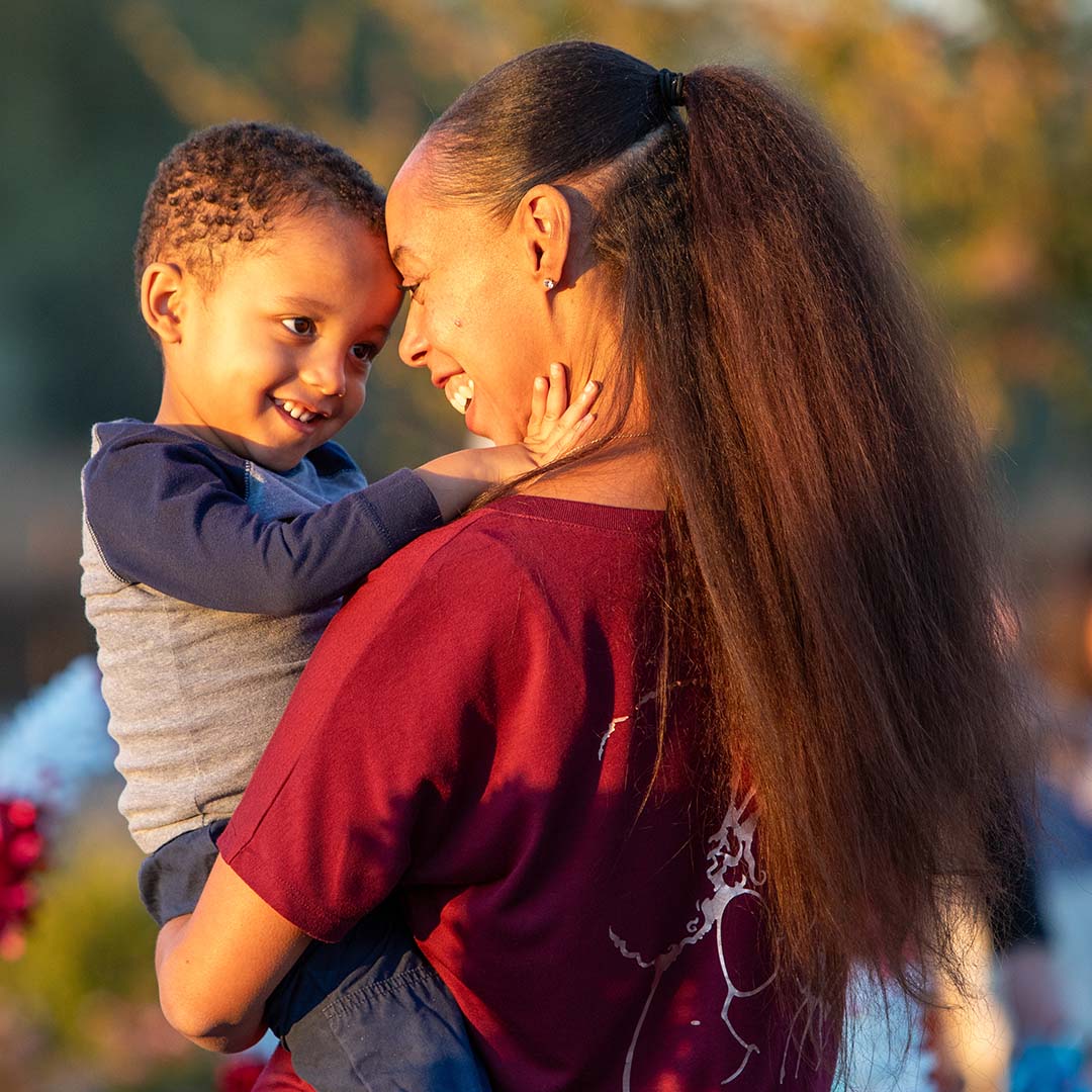 Mom and son special moment with foreheads touching