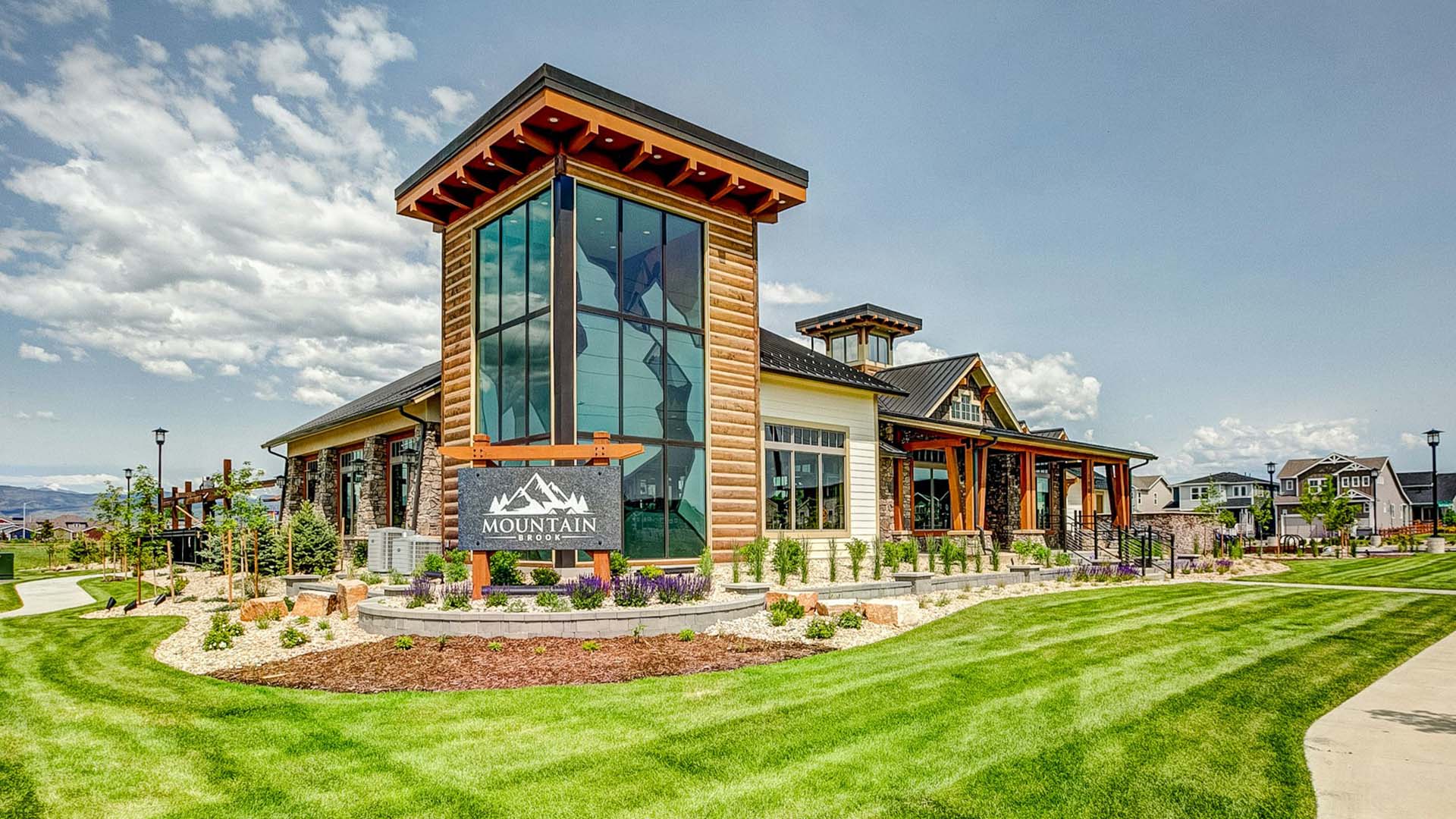 clubhouse with grassy area in front